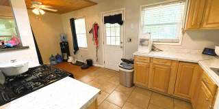 3/1 House w/ Huge Fenced Yard, Wood Floors,& Will Have New Paint! Walk to COLLEGETOWN/STADIUM! Avail August 8th for $1550/month! Gallery 11