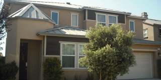 Love living near the Beach into this spacious 5 bedroom home Gallery 1