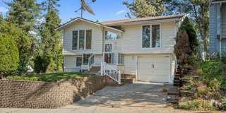 Spacious 4BR Split-Level in Spokane - Hardwoods, Granite Kitchen & Family Room Gallery 1
