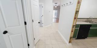 LOVELY 3/2 w/ Screened Porch, New Carpet in Bedrooms, Washer/Dryer, & Privacy Fenced Yard! Includes Lawn Maint! $1575/month Avail NOW! Gallery 12