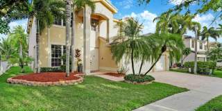 Beautiful Canal-Front 4BR Home with Pool & 3-Car Garage Gallery 1