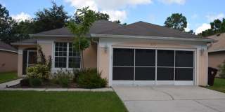 Beautiful 3 bedroom home with a den or office located in the prestigious Southern Dunes man gated golf community! Gallery 1