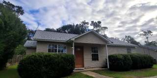 LOVELY 3/2 w/ Washer/Dryer, Large Yard, Tile Floors Throughout, New Paint, & Vaulted Ceilings! Avail NOW for $1550/month! Gallery 1