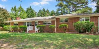 Renewed Williamsburg Brick Rancher with Huge Backyard & Modern Upgrades Gallery 1