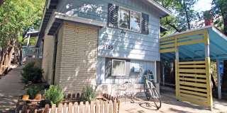 5Bed/2.5bath with two kitchens, fenced yard and covered carport. Gallery 1