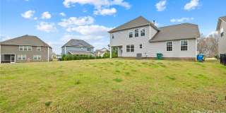 Rare 2023-built home on an oversized 0.35-acre lot in one of Waxhaw's most sought-after communities — zoned for the 9/10-rated Waxhaw Elementary School and move-in ready today. Gallery 13