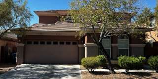 Spacious 4-Bedroom Mountains Edge Home with Downstairs Suite, Balcony & Covered Patio Gallery 1