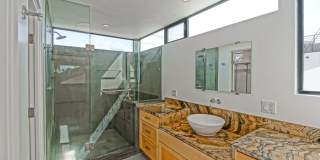 MODERN & BRIGHT. TOP-FLOOR, 4BR3BA HOUSE-LIKE APARTMENT W/ OPEN FLOOR PLAN, 3 DECKS FOR INDOOR/OUTDOOR LIVING & 2-CAR GARAGE JUST BLOCKS TO ABBOT KINNEY, PARK & MINS TO CANALS & BEACH! Gallery 37