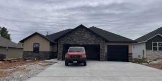 Beautiful, brand-new, 4-bedroom, 2-bath home in Nixa with a 3-car garage. Gallery 1