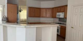 Beautiful 3 bed home with 3 car garage in Indian Hills behind Target Gallery 20