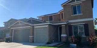 4 Bedroom Home with Paid Solar, 3-Car Garage & Large Backyard Gallery 1