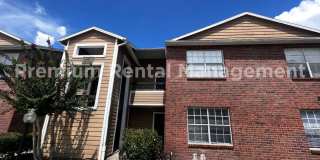 3/2 Regency Gardens 1st Floor Condo with New Plank Fooring, Stainless Appliances, and Fresh Paint! Gallery 1