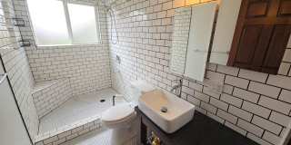 Beautifully designed 2BD/1BA home located near Henderson Center! Gallery 12