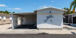 BEAUTIFUL 1 BEDROOM, 1 BATHROOM + BONUS ROOM HOME LOCATED IN THE HIGHLY SOUGHT AFTER 55+ BRADENTON TROPICAL PALMS COMMUNITY! Gallery 3