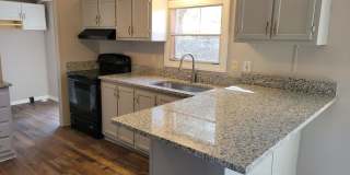 Charming and Peaceful Private Home with Granite Countertops & Wooded Views Gallery 1