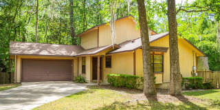 Check out this huge private fenced back yard at this Timberlane home! Gallery 1