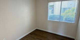 2BR/1BA Lakeside ground floor condo with 1 car detached garage, 1 uncovered parking space & community pool. Gallery 5