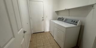 Single-level 3-bedroom home in a desirable Chandler location featuring a 2-car garage and tile roof and wood plank flooring throughout Gallery 34