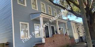 MOVE IN SPECIAL $250.00 OFF 1st Month's Rent- 2 bedroom, 1.5 bath apartment with W/D unit and shared fenced in yard! Gallery 1