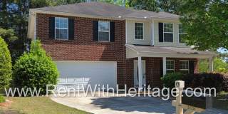 Gorgeous Brick Home with Golf Course / Lake View in Popular Mirror Lake Golf/ Swim / Tennis Subdivision. Gallery 1