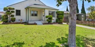 Spacious 4-Bed Home with Backyard, Garage & Prime Westside Access Gallery 1