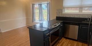 LOVELY CAPE COD WITH 4 BEDS, 2 BATHS AND GARAGE Gallery 8