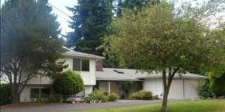 Spacious 4-Bed Tri-Level with 4-Car Garage — Walk to Elementary, Middle & High School Gallery 1
