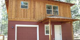 Peaceful 2-Bed Home on a Spacious 1-Acre Lot Gallery 1