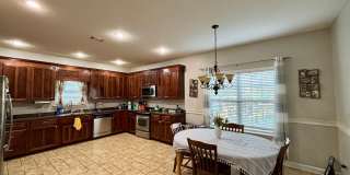 Spacious 4BR Home with Fireplace, Screened Porch & Privacy-Fenced Yard Gallery 7