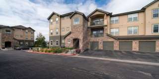 Beautiful two-bedroom condo with gorgeous views and a one-car garage, near Cottonwood Creek Park! Gallery 1