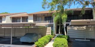 Bird Bay Village Annual Rental – Furnished 1st Floor Unit with Covered Parking Gallery 1