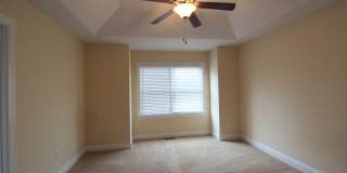 Spacious 3 Bedroom, 3.5 Bathroom Townhome with Finished Basement, Fenced Yard & Garage Gallery 25