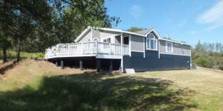 Rescue 4/3 retreat - includes separate cottage/office, 2 garage bays, RV pad and 5 acres with Sierra Views! Gallery 1