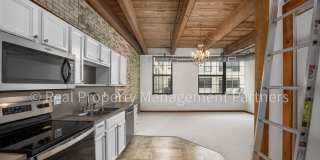 940 Monroe - Studio Condo with Exposed Brick, Soaring Ceilings, Heated Pool, Rooftop Deck, Utilities Included 940 Monroe - Studio Condo with Exposed Brick, Soaring Ceilings, Heated Pool, Rooftop Deck, Utilities Included Gallery 1