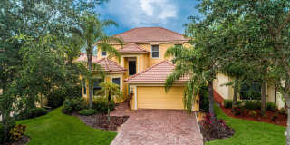 Spacious 5-Bedroom Pool Home in Bella Terra with Lake Views – Available Now! Gallery 1