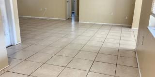 Beautiful 2/2/1 1150 Sq. Ft. with BONUS ROOM!!... tile & luxury plank flooring, Frest paint and a large fenced in yard! Gallery 11