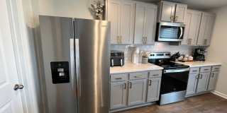 Discover this spacious 4-bedroom, 2.5-bath home in Winnabow, NC Gallery 12