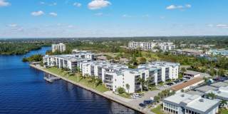 RIVERFRONT CONDO WITH A STUNNING VIEW! 1 + A DEN, 2 BATH ON CALOOSAHATCHEE! RIVERFRONT CONDO WITH A STUNNING VIEW! 1 + A DEN, 2 BATH ON CALOOSAHATCHEE! Gallery 1