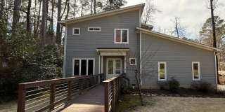 Modern 4BD, 3.5BA Raleigh Home on a Corner Lot with a 2-Car Attached Garage Private Backyard in a Prime Location Near NC State University, Downtown Raleigh, and More! Modern 4BD, 3.5BA Raleigh Home on a Corner Lot with a 2-Car Attached Garage Private Backyard in a Prime Location Near NC State University, Downtown Raleigh, and More! Gallery 1