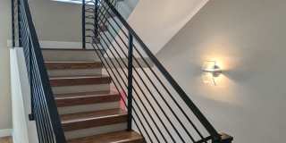 STUNNING 4-LEVEL TOWNHOME IN HIGHLANDS W/ 2-CAR GARAGE +AMAZING ROOFTOP DECK WITH VIEWS! Gallery 10