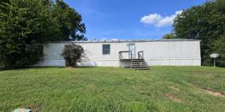 Affordable 3/2 Home with Water, Trash, and Lawn Care Included! Gallery 1