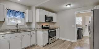 2 Bed/1 Bath just minutes from Augusta University and Surrey Center, featuring granite countertops, stainless steel appliances, and a private yard. Gallery 13