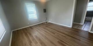 charming 2-bedroom, 1-bathroom home perfectly blends modern updates with bright, airy living Gallery 1