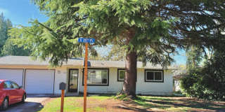 Charming 4BR Home with Huge Yard - W/D and Garage Gallery 1