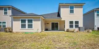 Beautiful Open Layout 4 Bed, 3 Full Bath | A True Masterpiece Backing to a Peaceful Pond with Modern Upgrades + Tesla Charging Gallery 37