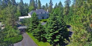"Experience Luxury Living: Expansive 4-Bedroom Retreat Estate with Scenic Views and Elegant Finishes on Spokane's South Hill with 1.5 Acres of privacy!" "Experience Luxury Living: Expansive 4-Bedroom Retreat Estate with Scenic Views and Elegant Finishes on Spokane's South Hill with 1.5 Acres of privacy!" Gallery 1