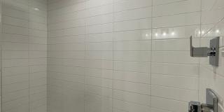 Modern 2BR + Office Townhome with Rooftop Deck in Prime Sunnyside/Highlands Location Gallery 16