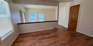 August 15th rent special! New deck! 3 Bedroom, updated kitchen, updated flooring, garage, driveway, and fenced yard - 9 month lease available! Gallery 3
