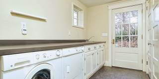 Stunning Tudor-style 4BR/3.5BA home in a prime, unbeatable location! Gallery 13