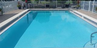 UPGRADED WATERFRONT END UNIT 3 BR / 2 BA Home With BOAT LIFT/ DOCK & OUTSTANDING VIEWS Gallery 1